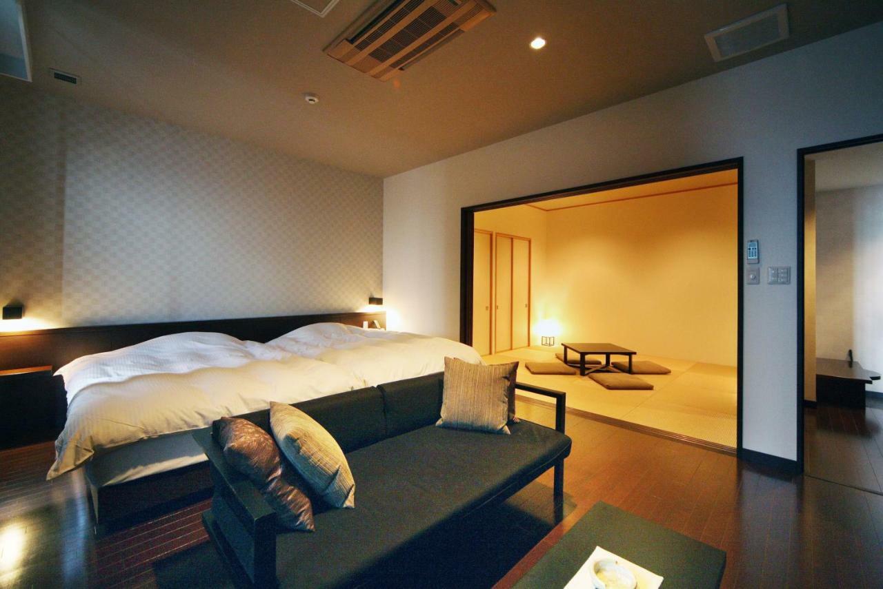Amane Resort Seikai Beppu Buitenkant foto A Japanese-style room with a futon